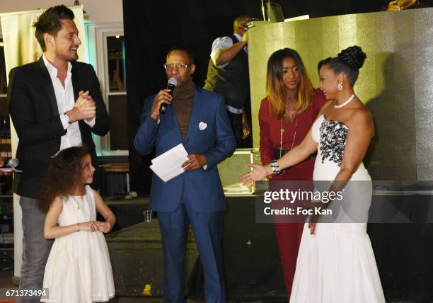 Presenter Hapsatou Sy, APIPD president Jenny Hippocrate and Hapsatou Sy husband TV presenter Vincent Vincent Cerutti and guests attend APIPD Auction...