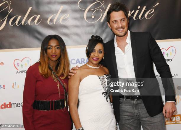 Presenter Hapsatou Sy, APIPD president Jenny Hippocrate and Hapsatou Sy husband TV presenter Vincent Vincent Cerutti attend APIPD Auction Gala 3rd...