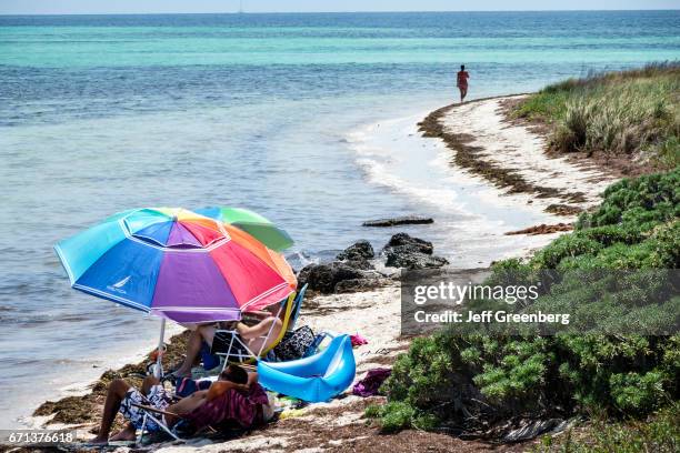 Sunbathers on the beach at Bahia Honda State Park.