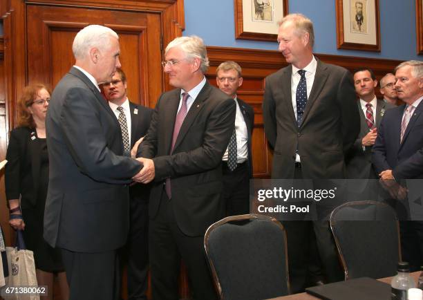 Vice President Mike Pence, left, meets CEO of Westfield, Steven Lowy, while attending a business listening session with Australian and U.S....