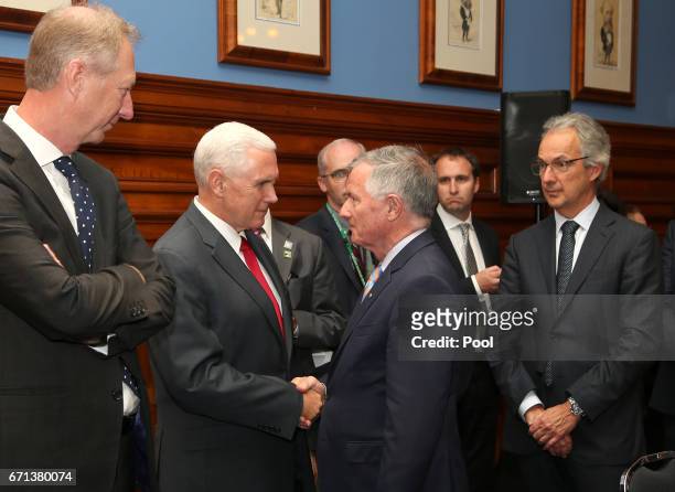 Vice President Mike Pence, center left, meets Chair, Industry Super Australia Peter Collins, center right while attending a business listening...