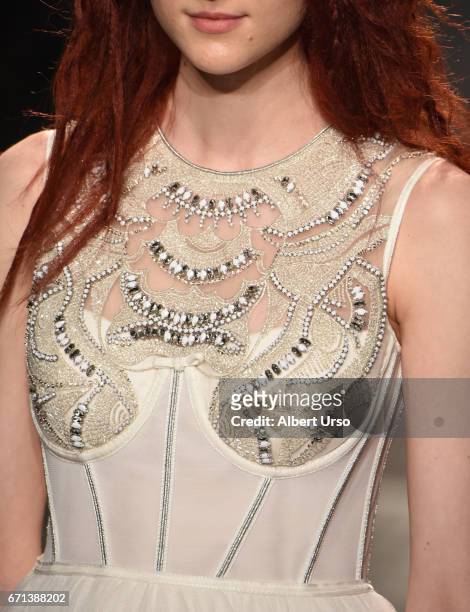 Model, dress detail, walks the runway at the Jenny Packham show during New York Fashion Week: Bridal on April 21, 2017 in New York City.