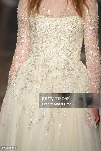 Model, dress detail, walks the runway at the Jenny Packham show during New York Fashion Week: Bridal on April 21, 2017 in New York City.