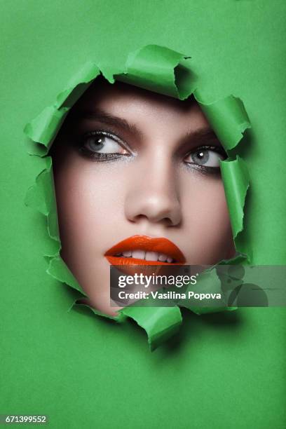 158 Beautiful Woman Looking Through Paper Stock Photos, High-Res ...