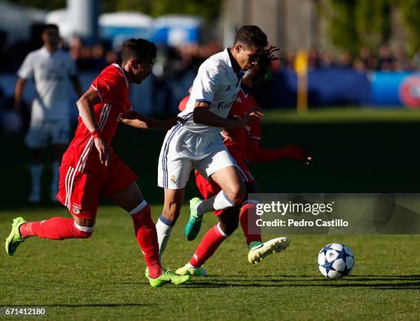 Achraf Hakimi of Real Madrid duel for the ball during the UEFA Youth League Final Four match between Real Madrid CF and Benfica at Colovray Stadium...