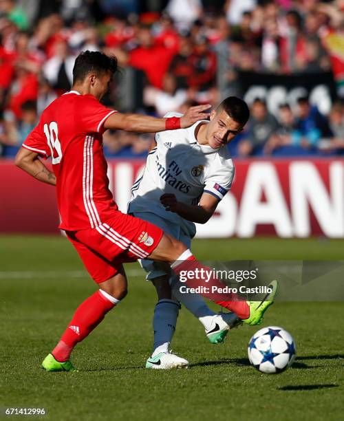 Jaime Seoane of Real Madrid competes for the ball with Diogo Goncalves of Benfica during the UEFA Youth League Final Four match between Real Madrid...