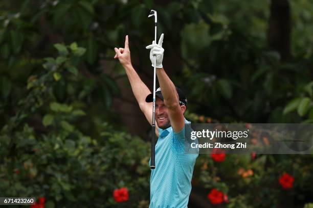 Gregory Bourdy of France celebrates after getting a hole in one at Tee No.3 during the third round of the Shenzhen International at Genzon Golf Club...