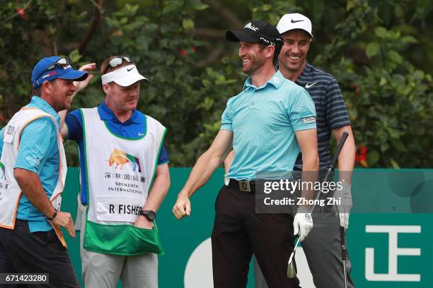 Gregory Bourdy of France celebrates after getting a hole in one at Tee No.3 during the third round of the Shenzhen International at Genzon Golf Club...