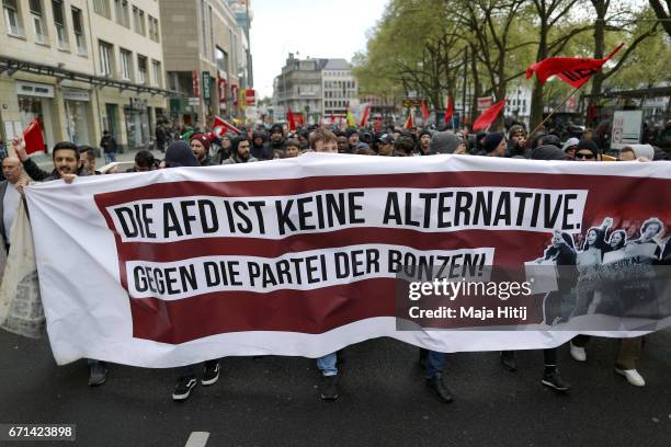 Protesters hold up a sign reading 'The AFD is not an alternative' as they demonstrate against the right-wing populist Alternative for Germany...