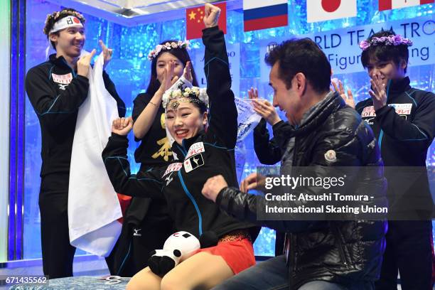 Wakaba Higuchi of Japan celebrates with her team mates at kiss and cry after the Ladies free skating during the 3rd day of the ISU World Team Trophy...