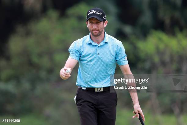 Gregory Bourdy of France celebrates a shot during the third round of the Shenzhen International at Genzon Golf Club on April 22, 2017 in Shenzhen,...