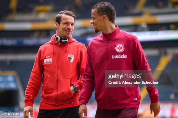 Markus Feulner of Augsburg and Timothy Chandler of Frankfurt are seen during the Bundesliga match between Eintracht Frankfurt and FC Augsburg at...