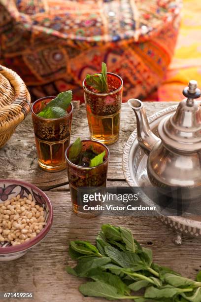 moroccan tea ceremony - three glasses, teapot on tray - moroccan culture stock pictures, royalty-free photos & images