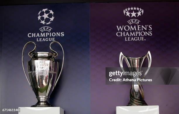 The Champions League and Women's Champions League trophies on display outside the stadium prior to the Premier League match between Swansea City and...
