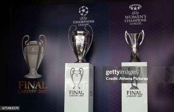 The Champions League and Women's Champions League trophies on display outside the stadium prior to the Premier League match between Swansea City and...