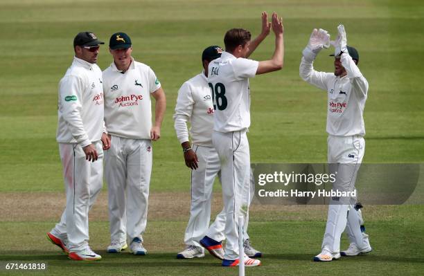 Jake Ball of Nottinghamshire celebrates the wicket of Luke Wright of Sussex during Day Two of the Specsavers County Championship Division Two match...