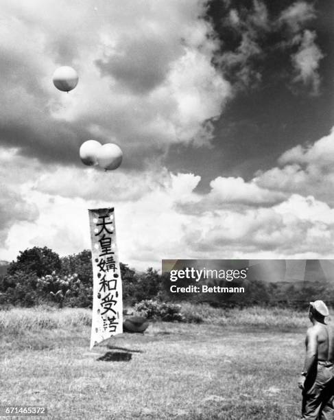 New method of informing Japs still holding out in the Sierre Madre Mountains that Hirohito had accepted unconditional surrender was tried recently by...