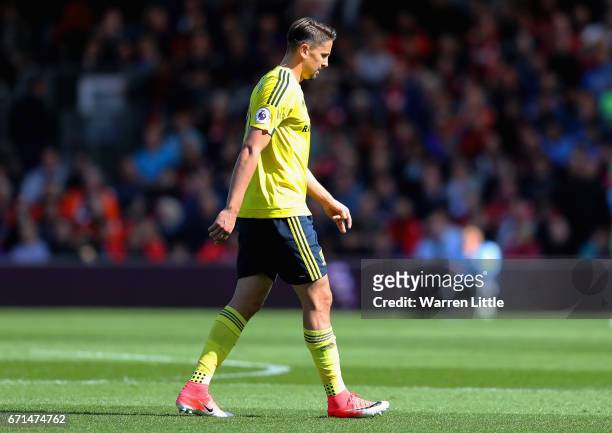 Gaston Ramirez of Middlesbrough walks off the pitch after being shown a red card during the Premier League match between AFC Bournemouth and...