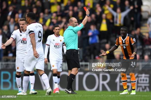 Oumar Niasse of Hull City is shown a red card during the Premier League match between Hull City and Watford at the KCOM Stadium on April 22, 2017 in...