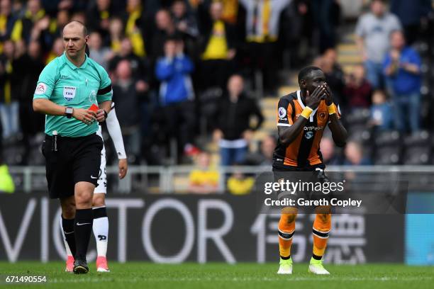 Oumar Niasse of Hull City is shown a red card during the Premier League match between Hull City and Watford at the KCOM Stadium on April 22, 2017 in...