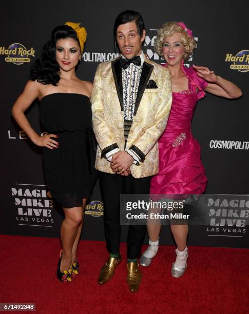 Singer and burlesque dancer Melody Sweets, The Gazillionaire character and cast member Wanda Widdle from the show "Absinthe" joke around on the red...