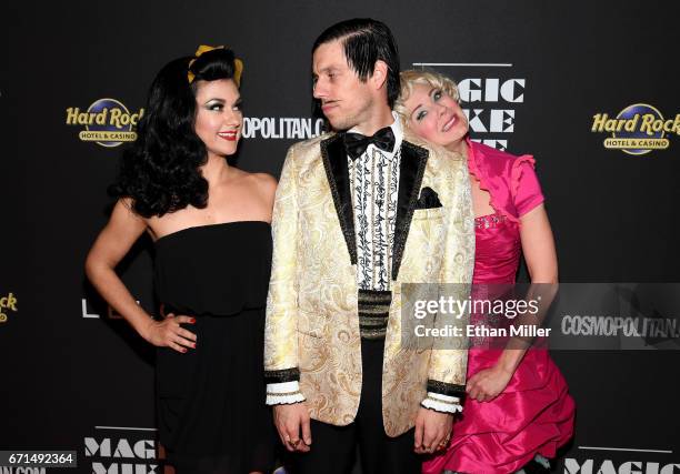 Singer and burlesque dancer Melody Sweets, The Gazillionaire character and cast member Wanda Widdle from the show "Absinthe" joke around on the red...