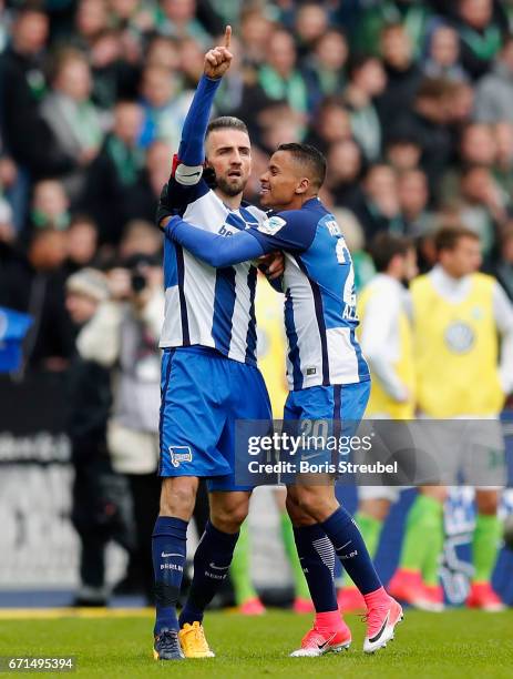 Vedad Ibisevic of Hertha BSC celebrates with team mate Allan of Hertha BSC after scoring his team's first goal during the Bundesliga match between...