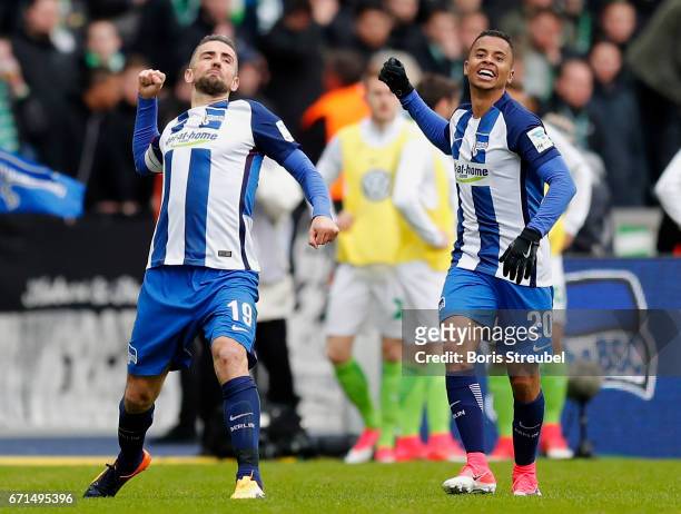 Vedad Ibisevic of Hertha BSC celebrates with team mate Allan of Hertha BSC after scoring his team's first goal during the Bundesliga match between...