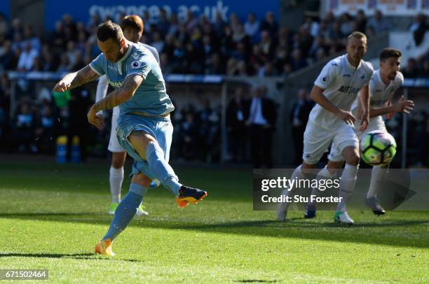 Marko Arnautovic of Stoke City misses a penalty during the Premier League match between Swansea City and Stoke City at the Liberty Stadium on April...