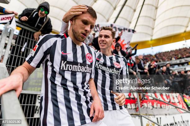 Ante Rebic of Frankfurt celebrates the third goal for his team with Guillermo Varela of Frankfurt during the Bundesliga match between Eintracht...