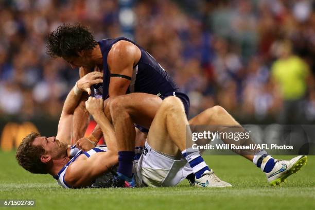 Brady Grey of the Dockers wrestles with Lachlan Hansen of the Kangaroos during the round five AFL match between the Fremantle Dockers and the North...