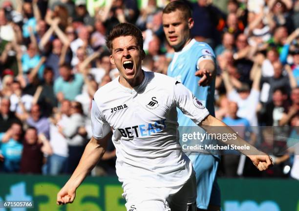 Tom Carroll of Swansea City celebrates after he scored his sides second goal during the Premier League match between Swansea City and Stoke City at...