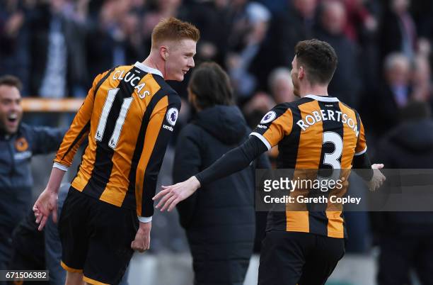 Sam Clucas of Hull City celebrates scoring his team's second goal with Andrew Robertson during the Premier League match between Hull City and Watford...