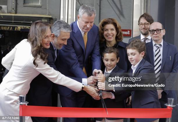 Mayor Bill de Blasio and MOME Commissioner Julie Menin attend a ribbon-cutting ceremony for the relaunch of the Quad Cinema in Greenwich Village, New...