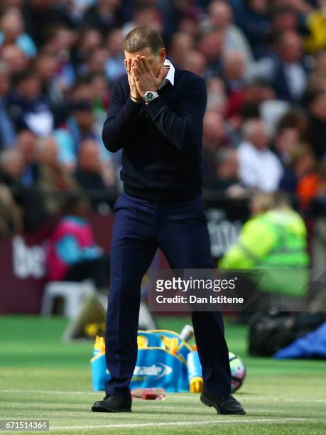 Slaven Bilic, Manager of West Ham United reacts during the Premier League match between West Ham United and Everton at the London Stadium on April...