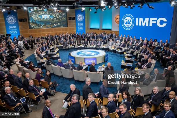 In this handout provided by the IMF, IMFC members pose for a photograph April 22, 2017 at the IMF Headquarters in Washington, DC. The IMF/World Bank...