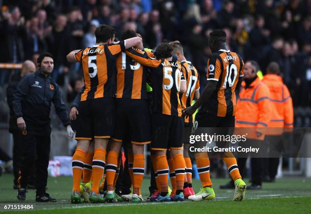 Sam Clucas of Hull City celebrates with team mates after scoring his sides second goal during the Premier League match between Hull City and Watford...