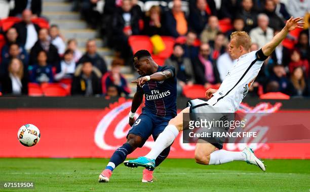 Paris Saint-Germain's Ivorian defender Serge Aurier vies with Montpellier's defender Lukas Pokorny during the French L1 football match between Paris...