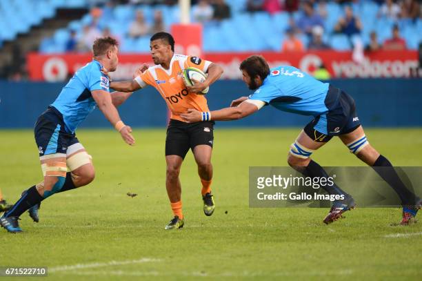 Hanro Liebenberg and Lood de Jager of the Bulls tackle Clayton Blommetjies of the Cheetahs during the Super Rugby match between Vodacom Bulls and...