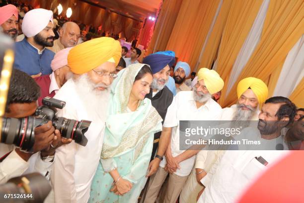 Shiromani Akali Dal Chief Sukhbir Singh Badal and Union Food Processing Industry Minister Harsmit Kaur Badal with Minister of Consumer Affairs, Food...