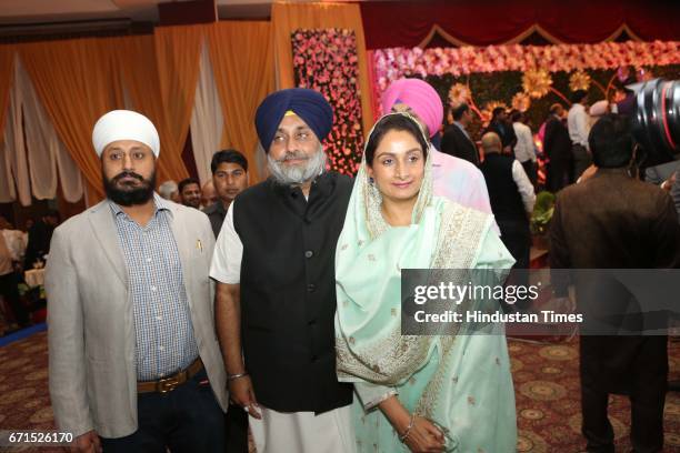 Shiromani Akali Dal Chief Sukhbir Singh Badal and Union Food Processing Industry Minister Harsmit Kaur Badal during the wedding reception of INLD MP...