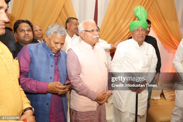 Haryana Chief Minister Manohar Lal Khattar with former Haryana Chief Minister Om Prakash Chautala during the wedding reception of INLD MP Dushyant...