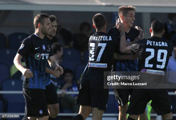 Andrea Conti of Atalanta BC celebrates with his team-mates after scoring the opening goal during the Serie A match between Atalanta BC and Bologna FC...