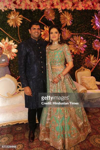 Dushyant Chautala with Meghna Ahlawat during their wedding reception at Ashoka Hotel, on April 20, 2017 in New Delhi, India. Dushyant Chautala is the...