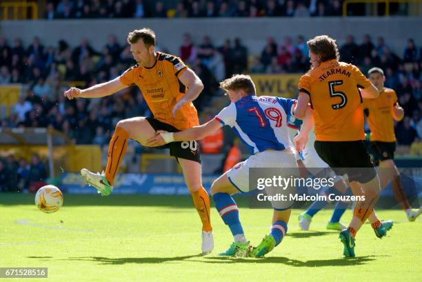 Mike Williamson of Wolverhampton Wanderers competes with Sam Gallagher of Blackburn Rovers during the Sky Bet Championship match between...