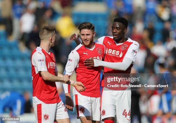 Fleetwood Town's Ashley Hunter, Wes Burns and Devante Cole celebrate at the end of the game during the Sky Bet League One match between Gillingham...