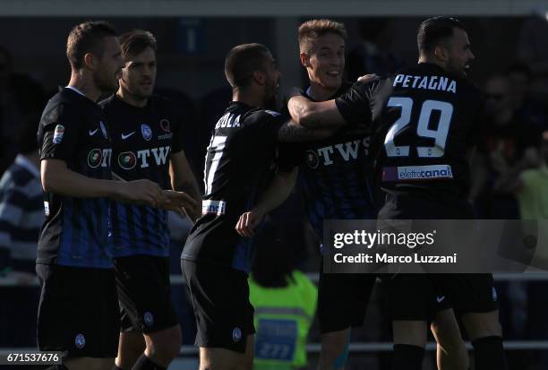 Andrea Conti of Atalanta BC celebrates with his team-mates after scoring the opening goal during the Serie A match between Atalanta BC and Bologna FC...