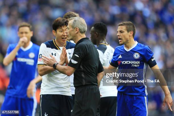 Heung-Min Son of Tottenham Hotspur protests to Martin Atkinson after a penalty is awarded to Chelsea during The Emirates FA Cup Semi-Final between...