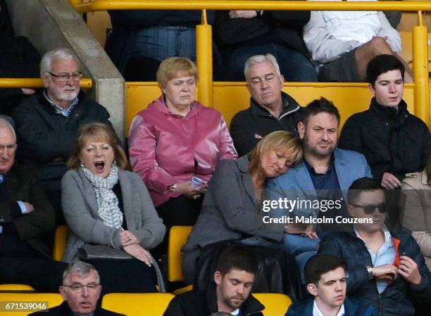 Supporters react with a yawn and a snooze during the Sky Bet Championship match between Wolverhampton Wanderers and Blackburn Rovers at Molineux on...