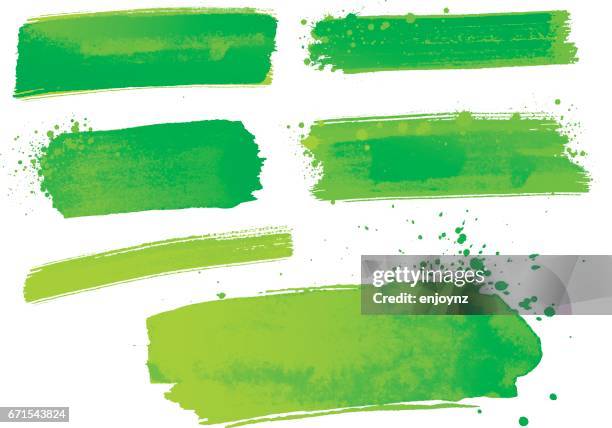 grüne aquarellfarbe striche - water color brush stroke stock-grafiken, -clipart, -cartoons und -symbole